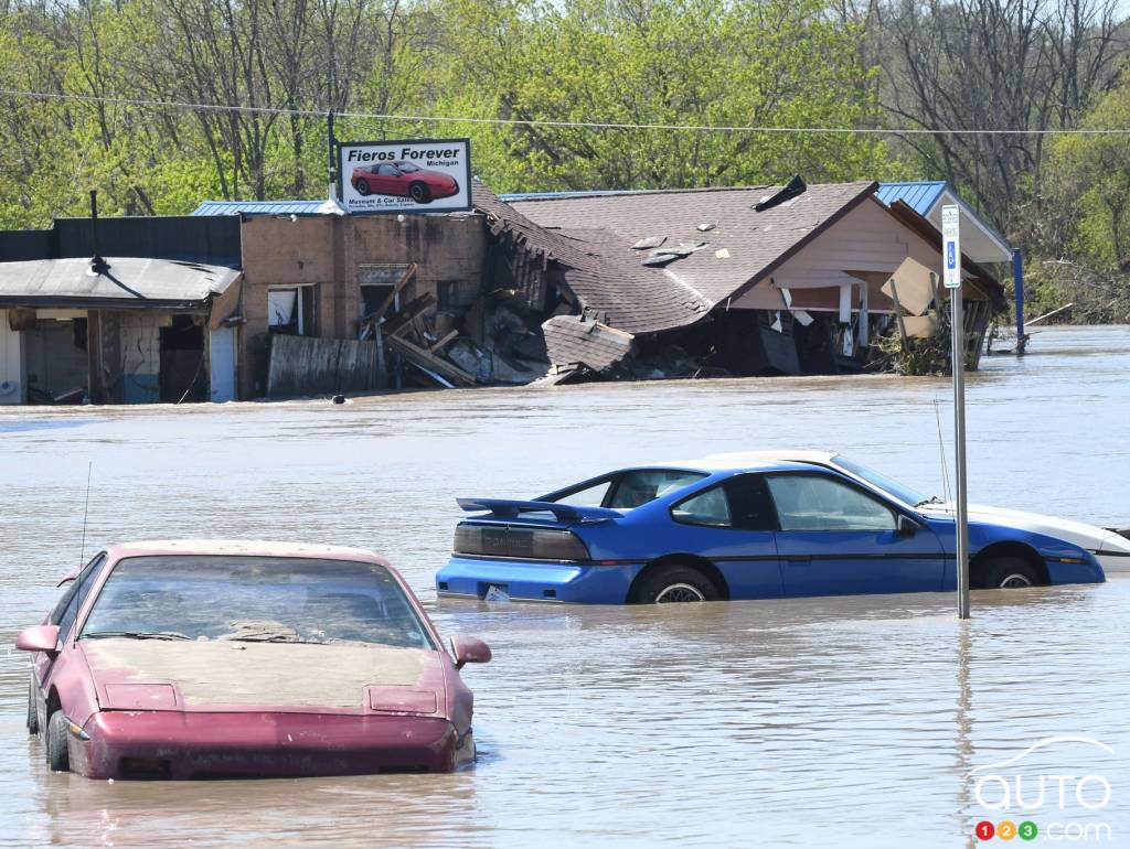 Pontiac Fieros under water, in Sanford, MI